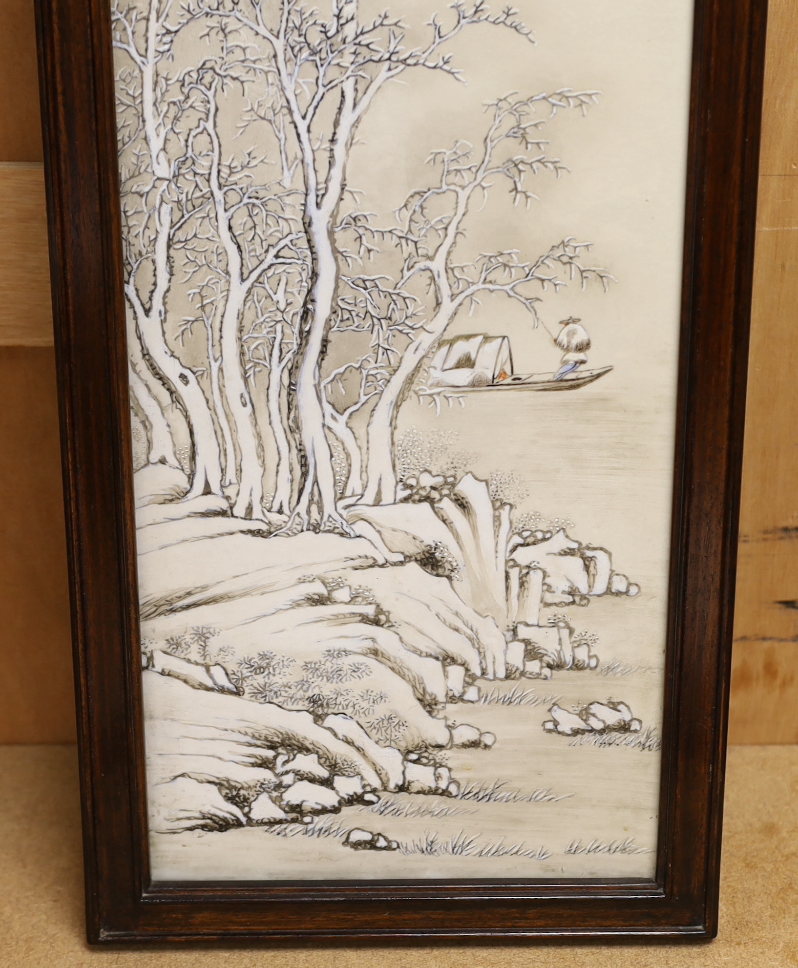 An early 20th century Chinese enamelled porcelain 'winter scene' plaque, framed, 85 x 25cm total